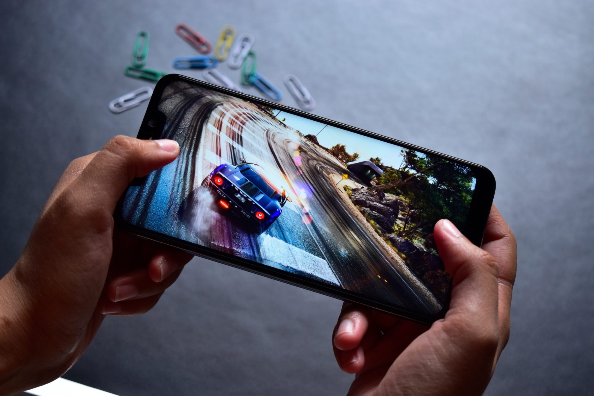 Mobile gaming demonstration shown on a smartphone screen during a technology showcase