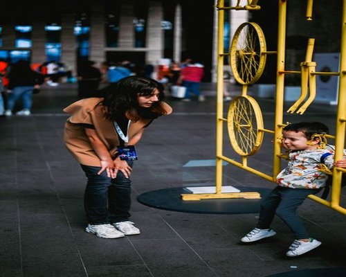 Family engaged with interactive displays